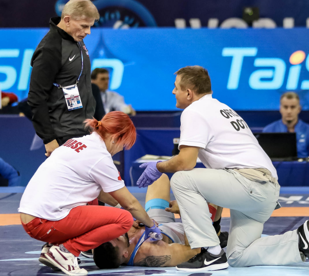 Geordan Speiller injured at the 2018 Worlds vs. Luis Avendano Rojas (VEN)