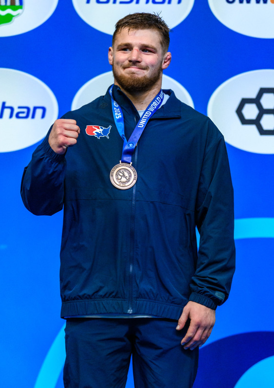 Payton Jacobson holding the U23 World bronze medal for 2025 at 87 kg